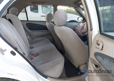 2000 Toyota Corolla Ce из США, поврежденный, VIN 1NXBR12E4YZ321410